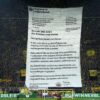 Scenografie excepțională creată de fanii Borusiei Dortmund » Istoria din spatele mesajului de pe „Zidul Galben”